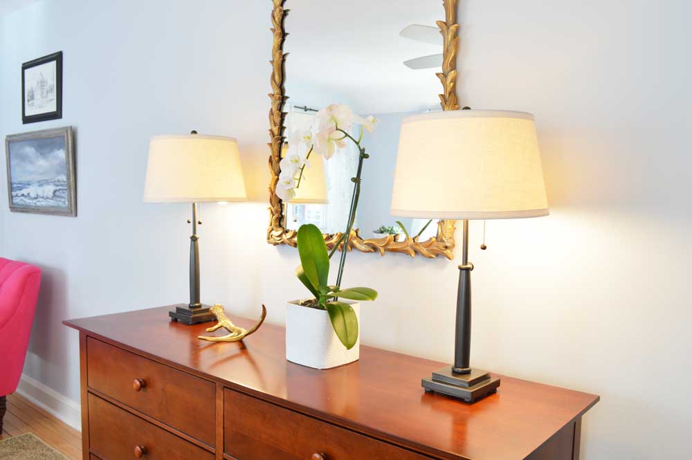 Dresser with Decorative Mirror and Lamps